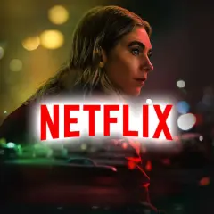 Kobieta w świetle neonów, logo Netflix. Szukasz fajnych filmów na Netflix?