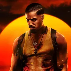 Michael B. Jordan jako John Kelly w filmie "Grzesznicy". W tle wielkie, pomarańczowe słońce.