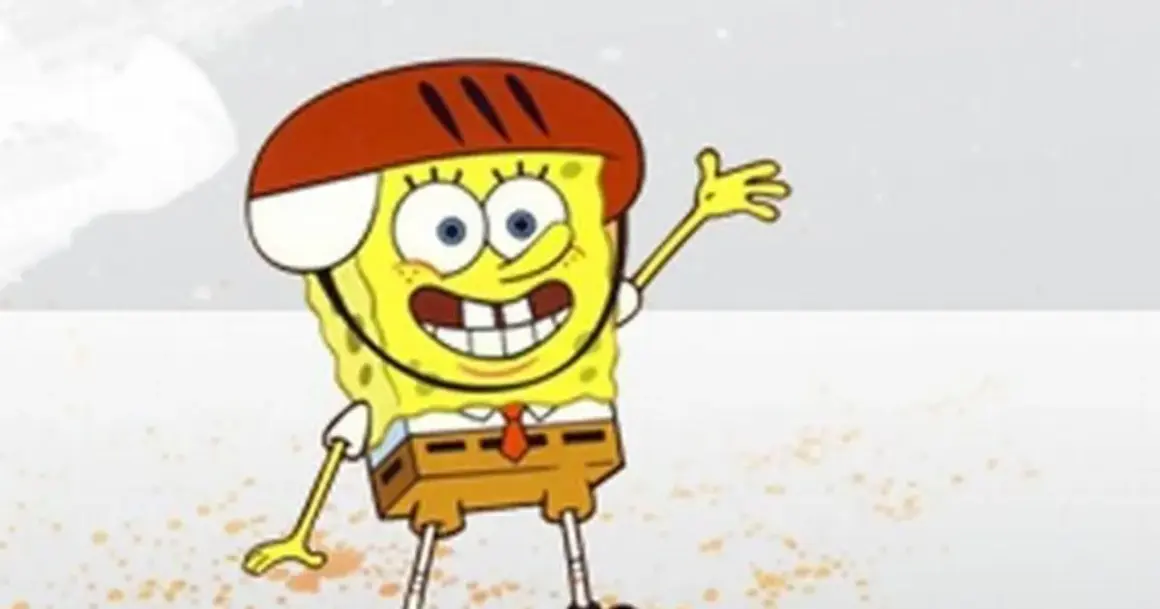 SpongeBob Kanciastoporty w kasku, macha ręką. Jedna z ulubionych spongebob postacie, gotowa na przygodę!